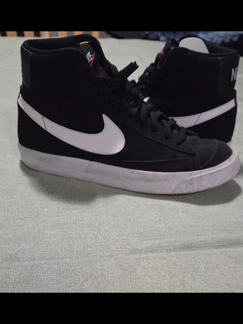 Nike Black and White High-Top Sneakers with Red Logo